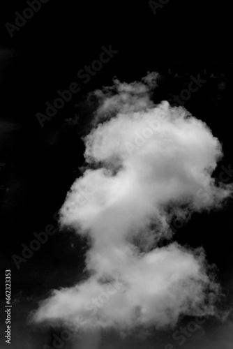 Clouds over black background .