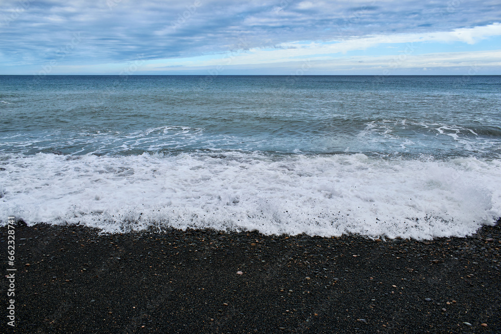 Pebble and black sand beach in Ajuy, Fuerteventura, Spain Pebble and black sand beach in Ajuy, Fuerteventura, Spain