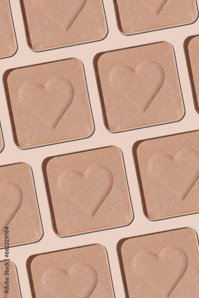 Minimal pattern eye shadow neutral beige swatches with shadow, monochrome photo, eyeshadow with heart imprint, skin colored powder for makeup, square shape metal pack, beauty cosmetic texture vertical Minimal pattern eye shadow neutral beige swatches with shadow, monochrome photo, eyeshadow with heart imprint, skin colored powder for makeup, square shape metal pack, beauty cosmetic texture vertical