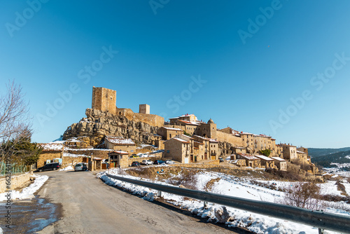 Panoramic view of the medieval village of Puertomingalvo, Teruel, Spain, with its castle. photo