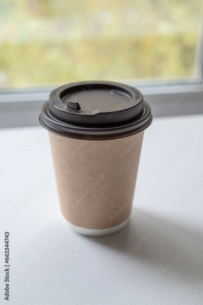 coffee glass on the table by the window coffee glass on the table by the window