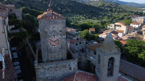 aerial view of an ancient clock tower in Castiglione della Pescaia