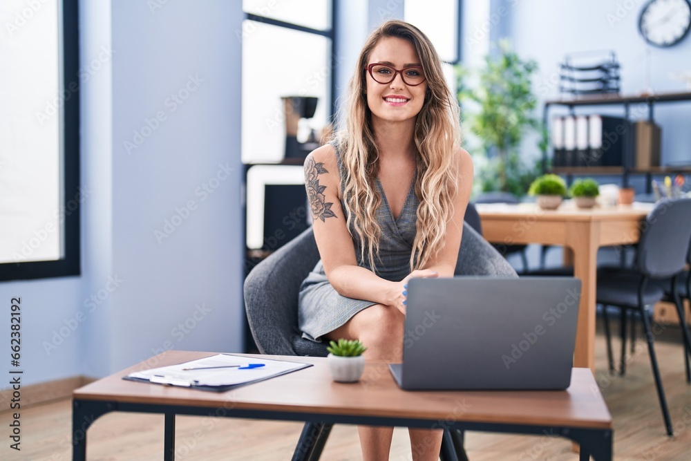 Young woman business worker smiling confident at office Young woman business worker smiling confident at office