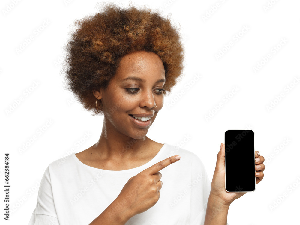 African american woman in white t-shirt showing phone and pointing with finger at blank black screen African american woman in white t-shirt showing phone and pointing with finger at blank black screen