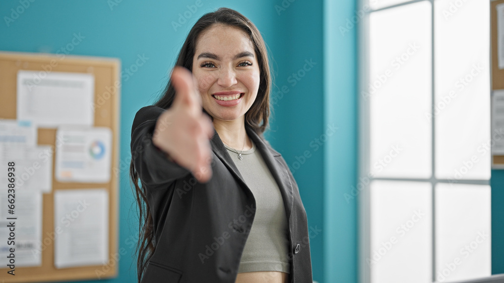 Young beautiful hispanic woman business worker smiling confident shake hand at the office Young beautiful hispanic woman business worker smiling confident shake hand at the office