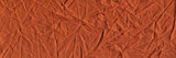 Brown color textile texture coarse crumpled fabric, fabric macro shooting background