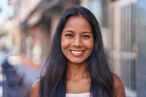 Free Download Young beautiful woman smiling confident standing at street - GFXLoad