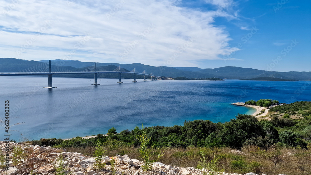 Panoramic view of Peljesac Bridge in Croatia, Summer 2023, Peljesac Peninsula in backgrond Panoramic view of Peljesac Bridge in Croatia, Summer 2023, Peljesac Peninsula in backgrond