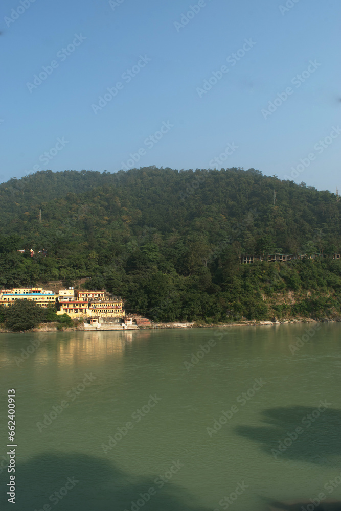 Ganga river with mountain and blue sky rishikesh view Ganga river with mountain and blue sky rishikesh view
