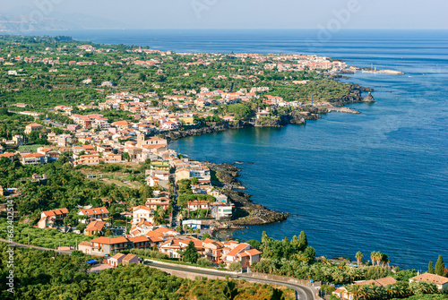 Aerial view of towns along the eastern coast of Sicily, near Acireale