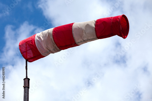 Airfield windsock in high winds photo