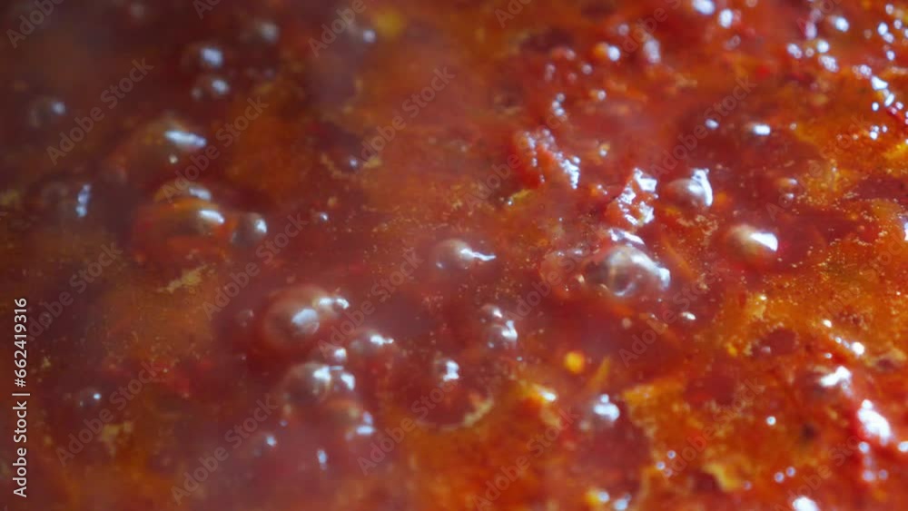 Red vegetable soup boiling on stove, Ukrainian borscht. Red vegetable soup boiling on stove, Ukrainian borscht.