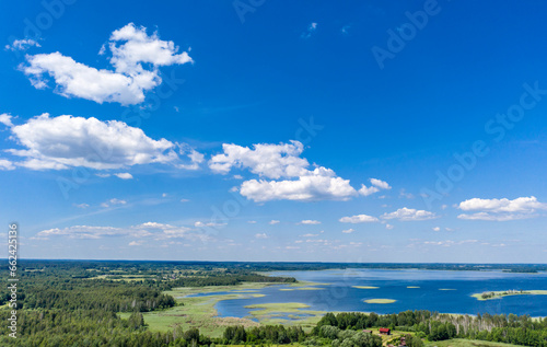 Drone shot on summer lake. Bird-eye view on summer lake.
