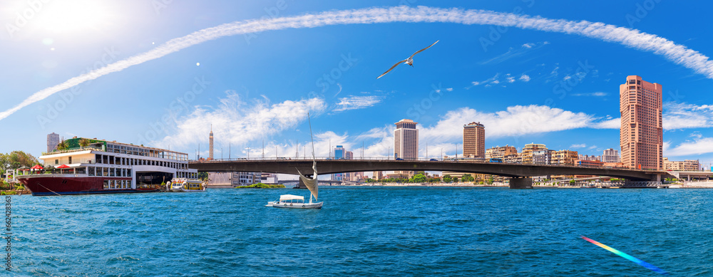 Great panorama of the Nile with modern bridge and buildings in the business district of Cairo, Egypt