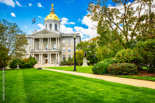 New Hampshire State House, in Concord, on a sunny morning. The capitol houses the New Hampshire General Court, Governor, and Executive Council. photo