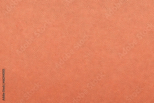 A close-up tactile allure of orange leather texture © ahmta