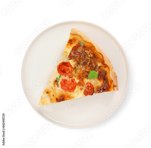 Piece of delicious homemade quiche prosciutto, tomatoes and greens isolated on white, top view