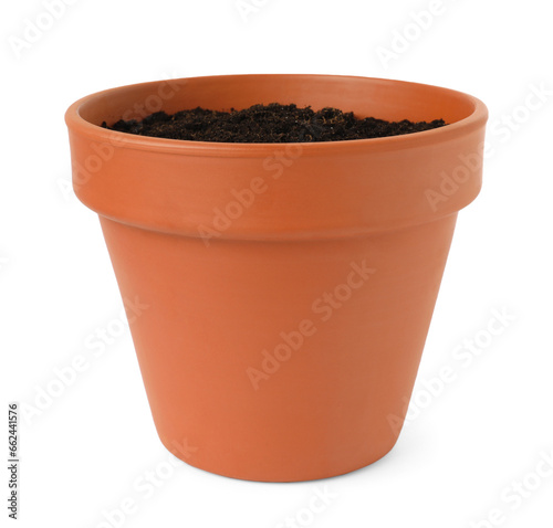 Clay flower pot with soil isolated on white