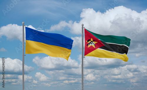 Mozambique and Ukraine flags, country relationship concept