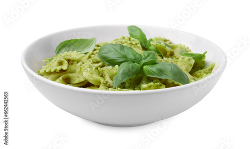 Delicious pasta with pesto sauce and basil isolated on white