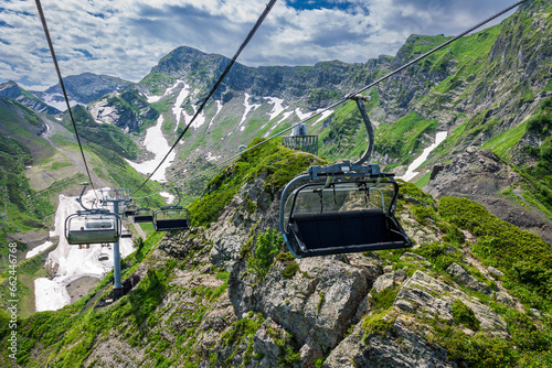 Cable car cabins in the mountains, mountain carousel lift, selective focus