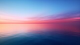 A large body of water with a sunset in the background