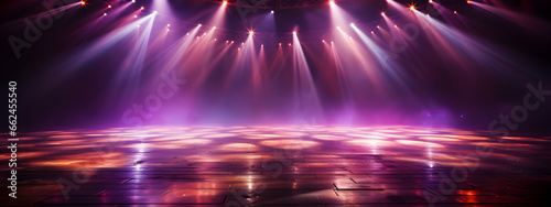 blue smoke and spotlights shine on stage floor in dark room, idea for background backdrop, abandon room or warehouse