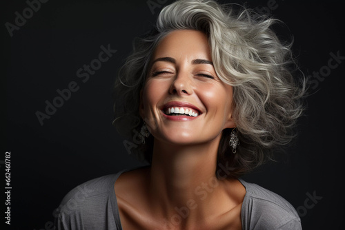 Radiant Older Woman with Smooth Skin and Gray Hair: Skincare
