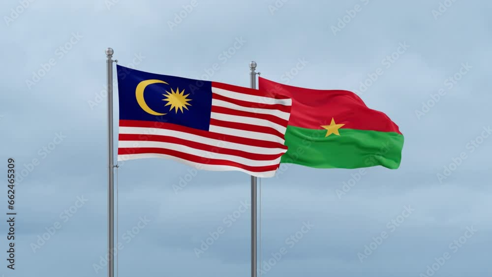 Burkina Faso flag and Malaysia flag waving together on cloudy sky, endless seamless loop, two country relations concept Burkina Faso flag and Malaysia flag waving together on cloudy sky, endless seamless loop, two country relations concept
