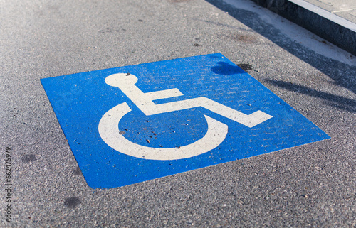 wheelchair accessibility sign against a modern cityscape, conveying equality and mobility for all photo