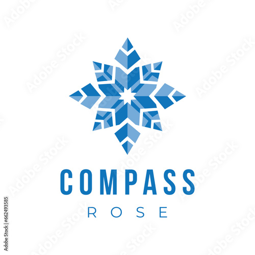this is an image of a compass rose in blue color in flat modern style on a white background that shapes like a snowflake