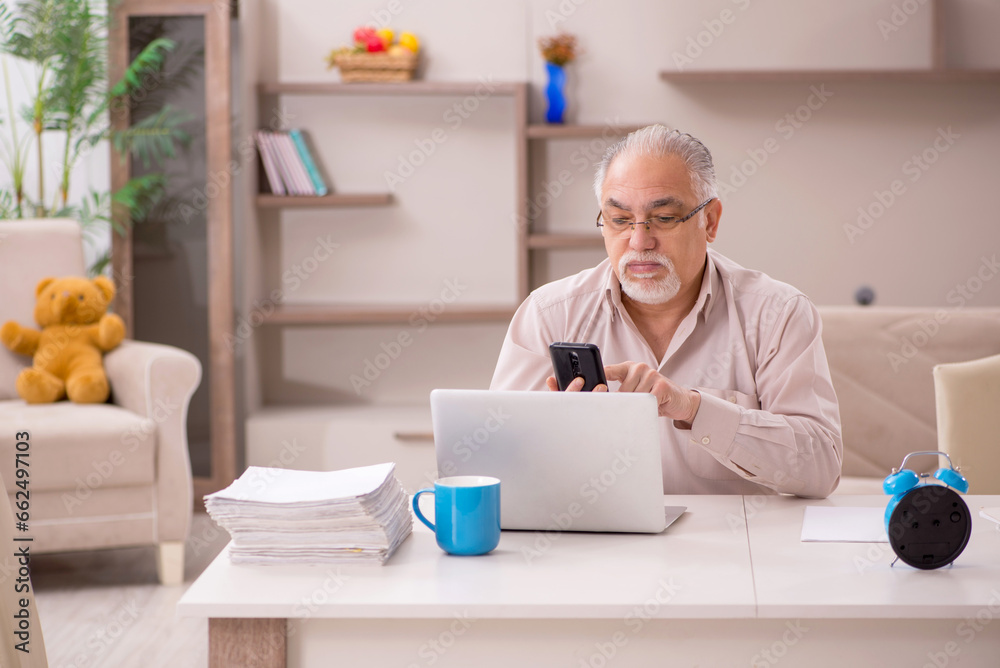 Old male boss employee working from home Old male boss employee working from home