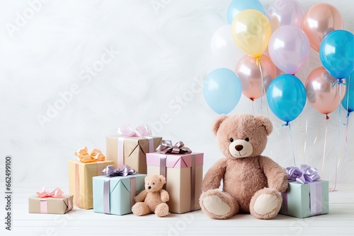 Birthday party supplies for an infant celebration on a white wall photo
