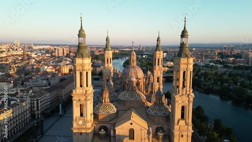Aerial view of the Cathedral-Basilica of Our Lady of the Pillar during the golden hour sunrise in the city of Zaragoza, Aragon, Spain