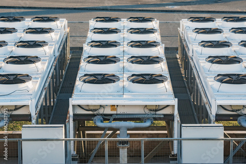 Air conditioning system assembled and installed on top of the building.