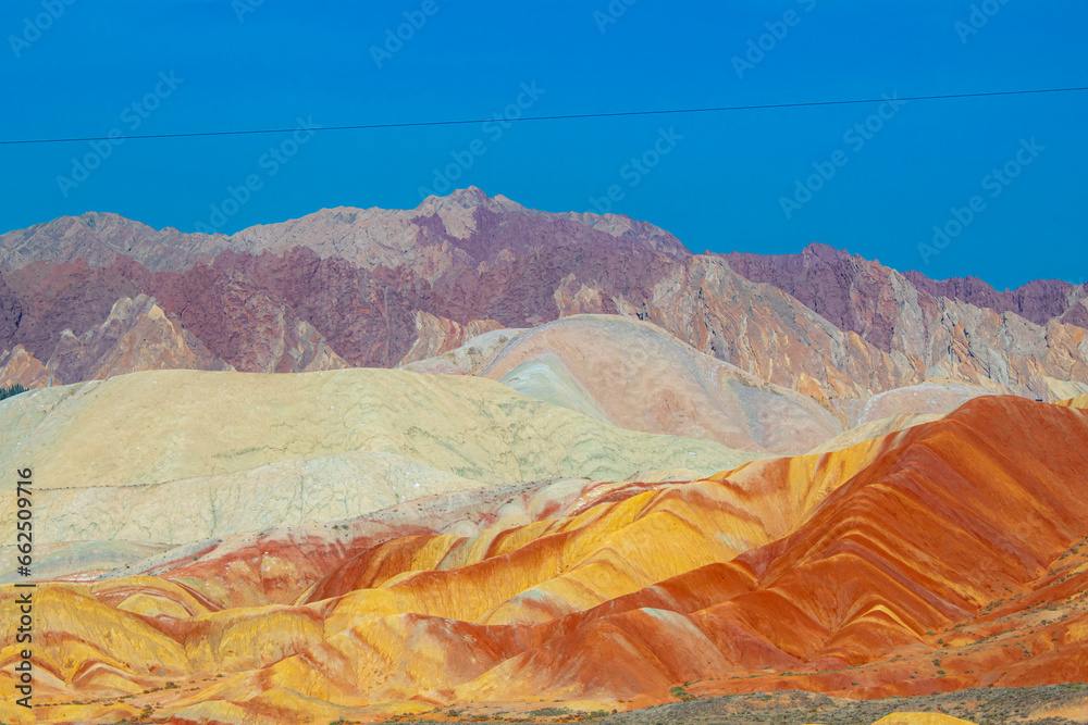 Amazing scenery of Rainbow mountain and blue sky background in sunset