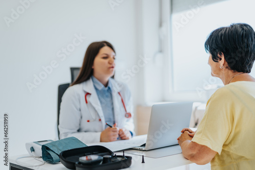 A caring doctor analyzes medical results, advises the patient with a positive diagnosis, and provides professional healthcare and treatment in a clinic or hospital.