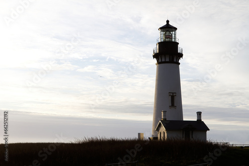 Lighthouse Standing On Hill With Cloudy Sky Newport Oregon