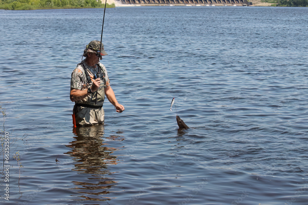 Fishing. One of a series of photos of fishermen catching northern pike. Fishing. One of a series of photos of fishermen catching northern pike.