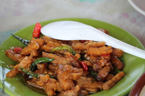 Oseng tempe is a traditional Indonesian dish that is delicious and spicy. photo