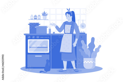 The girl is cooking in the kitchen