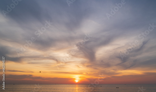 Abstract amazing Scene of stuning Colorful sunset or sunrise with clouds background in nature and travel concept, wide angle shot Panorama shot,Copy space