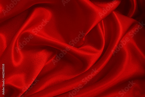 Dark red fabric texture background, detail of silk or linen pattern.