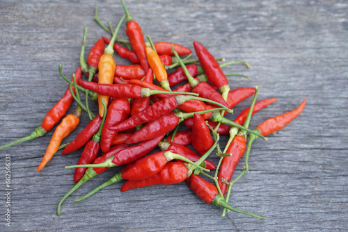 Organic red chillies. Concept, agriculture crops from garden. Food ingredient for seasoning with hot and spicy taste of food. Medicinal property. Medicine from nature vegetables. Thai hot chillies.   