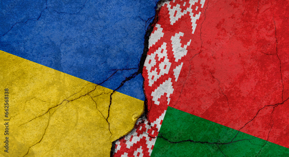 Ukraine and Belarus flags, concrete wall texture with cracks, grunge background, military conflict concept