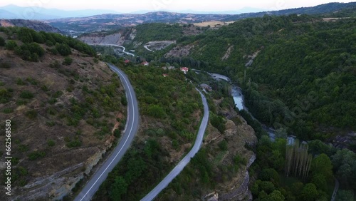 A Scenic Aerial Tour of Greece's Nestorio Village by the Riverside photo