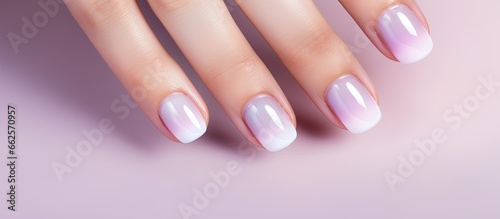 Gradient pink gel polish manicure on women s hands With copyspace for text