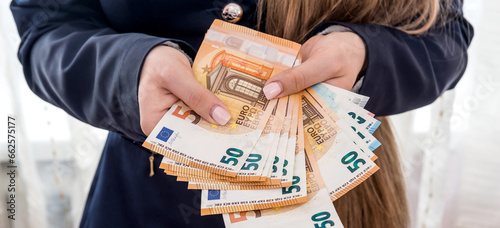 Fotografía Female hands counting large amount EU euro money
