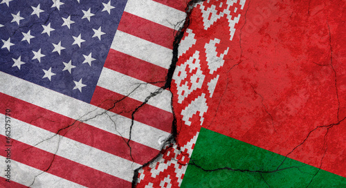 Fototapeta Naklejka Na Ścianę i Meble -  United States and Belarus flags, concrete wall texture with cracks, grunge background, military conflict concept