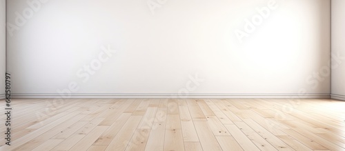 An empty room with white walls and a wooden floor With copyspace for text